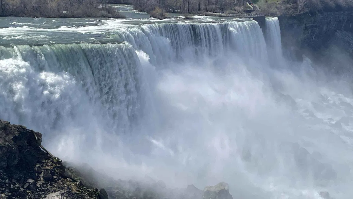 Two departures, toilet on board on a Niagara Falls tour from NYC, New York