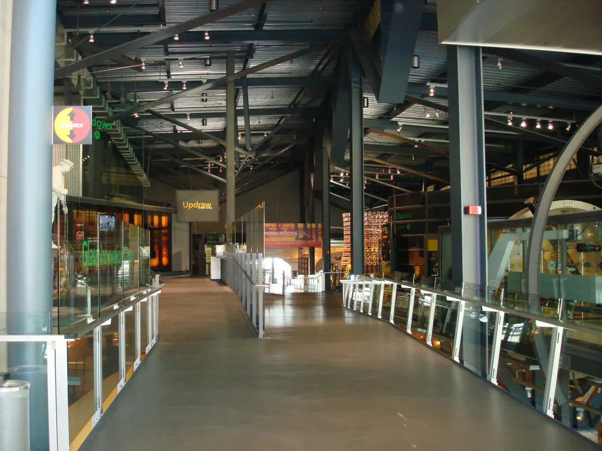 A gallery corridor inside the Corning Museum of Glass on a Niagara Falls tour from NYC, New York